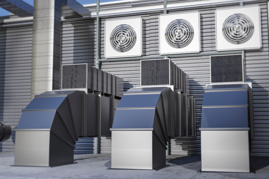 Trained engineer and certified technician opening up old faulty hvac system to replace it with new performant outside air conditioner after draining refrigerant and replacing ductwork